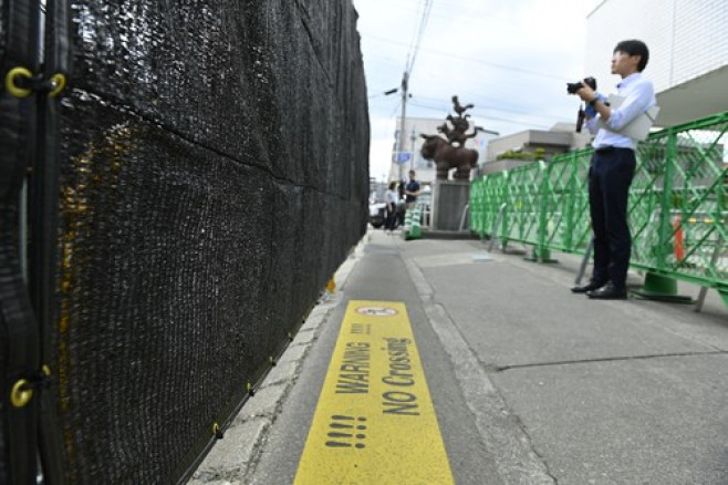 A black screen built to dissuade tourists from taking photos of Mount Fuji in Japan