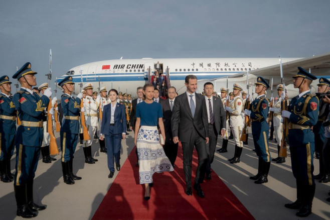 Syria's President Bashar al-Assad and First Lady Asma al-Assad arrive at Beijing airport in China, China - 24 Sep 2023