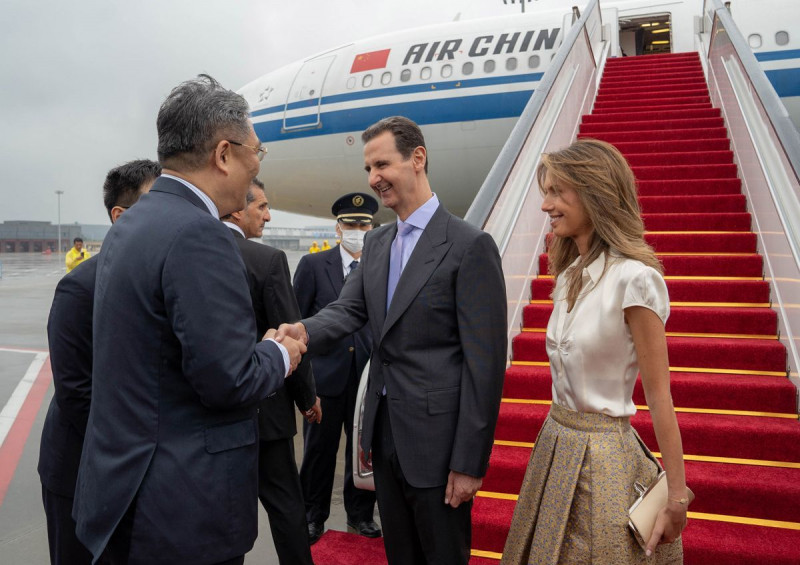 Syria's President Bashar al-Assad and First Lady Asma al-Assad arriving at the airport in Beijing, Beijing, China - 21 Sep 2023