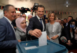 Bashar and Asma Al Assad Vote for Presidential Election - Douma