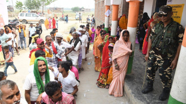 PATNA, INDIA - JUNE 1: Voters standing in queue for casting votes at a polling booth during seventh and last phase of Lo