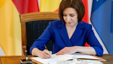 Berlin, Germany. 17th May, 2024. Maia Sandu, President of the Republic of Moldova, signs the guest book at Bellevue Palace. Credit: Fabian Sommer/dpa/Alamy Live News