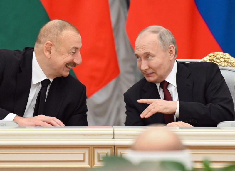 Meeting of Russian President Vladimir Putin and Azerbaijani President Ilham Aliyev in the Kremlin with veteran builders and workers of the Baikal-Amur Mainline on the occasion of the 50th anniversary of the beginning of its construction.