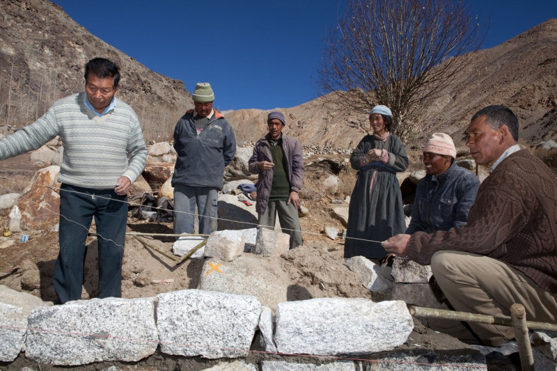 Chewang Norphel (L) at his artificial glacier project. He has 10 projects in the region to bring water to local villages.