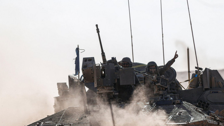 Rafah, Israel. 29th May, 2024. An Israeli tank operates, amid the ongoing conflict between Israel and the Palestinian Islamist group Hamas Mobility of tanks, armored personnel carriers, trucks and military jeeps belonging to the Israeli army continues on