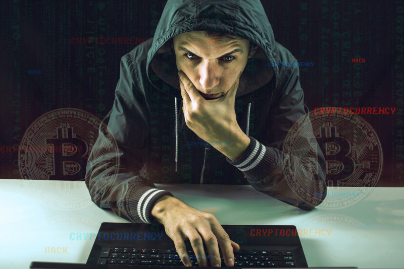 A,Hacker,With,A,Face,Is,Trying,To,Steal,Cryptocurrency