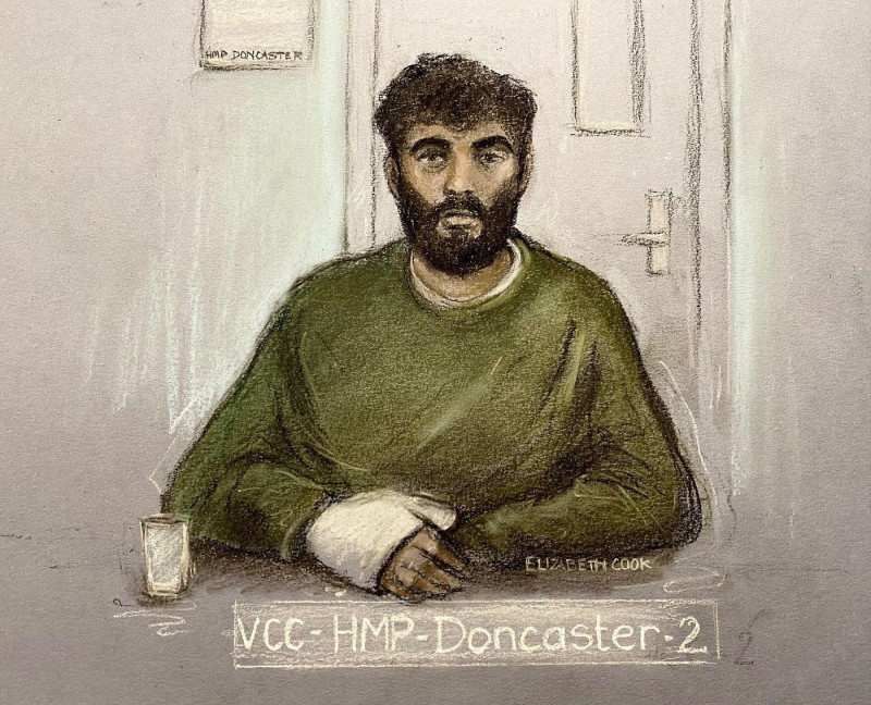 Court artist sketch by Elizabeth Cook of Hassan Jhangur, appearing via video link from HMP Doncaster, during a hearing at Sheffield Crown Court where he is charged with the murder of father-of-two Chris Marriott. Mr Marriott died after being hit by a car