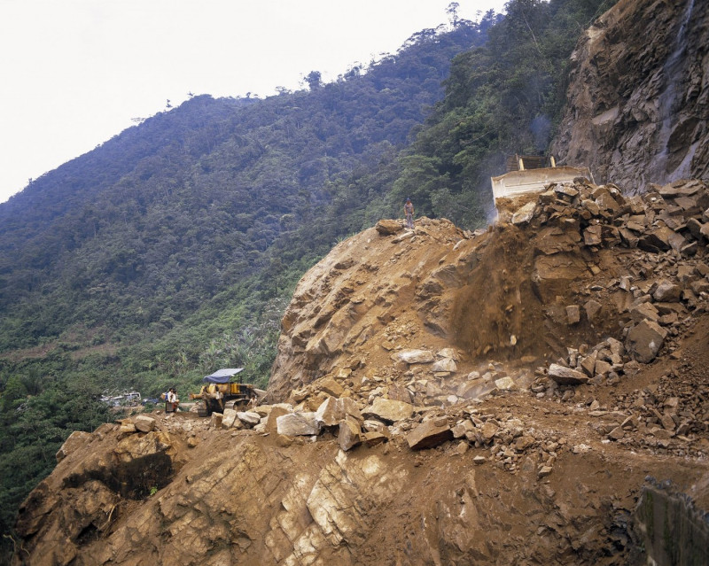 Clearing landslide on "Death Road", the La Paz to Coroico highway Bolivia