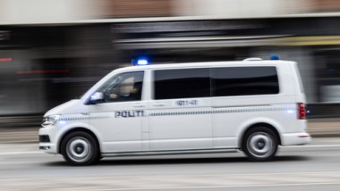 Police car responding to emergency in connection with the Danish 3F Superliga match between FC Copenhagen and Brondby IF
