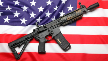 AR-15 (M4A1) custom carbine on the flag of USA