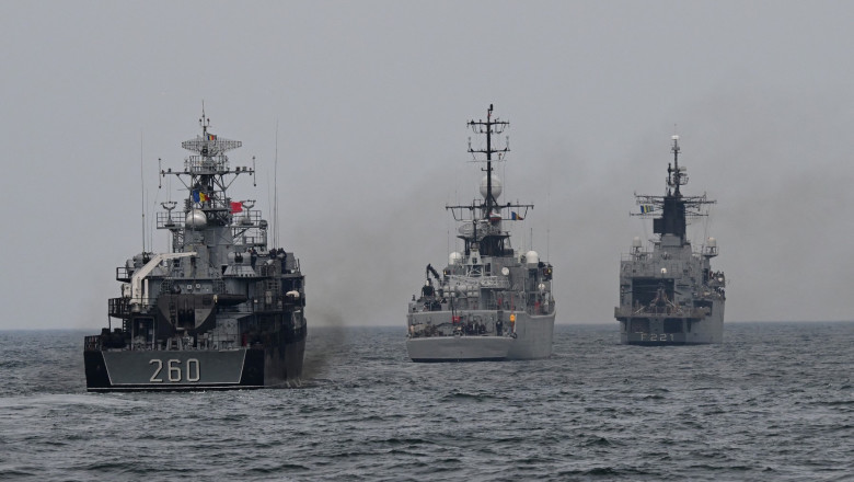 Romanian Navy frigate "King Ferdinand" (R), a Bulgarian war ship (C) and Romanian corvette "Admiral Barbuneanu" (L) march on the Black Sea during "Sea Shield 24" exercise April 16, 2024