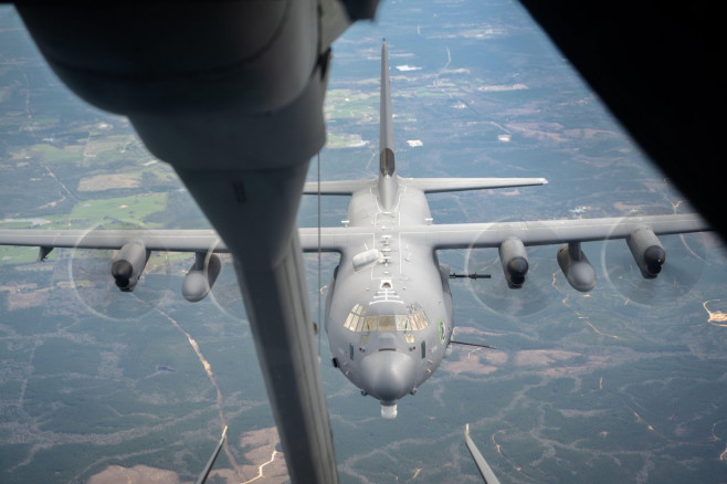 A U.S. Air Force AC-130J Ghostrider assigned to Hurlburt Field, Florida, practices aerial refueling procedures with a U.S. Air Force KC-10 Extender