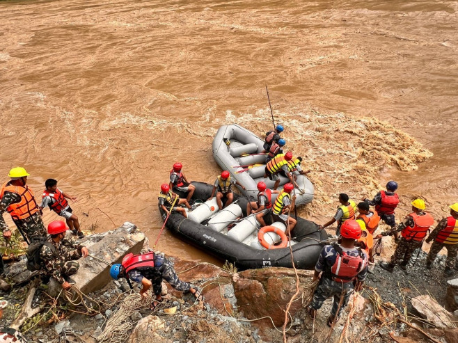 65 missing in Nepal after landslide sweeps buses into river