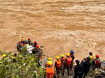 65 missing in Nepal after landslide sweeps buses into river