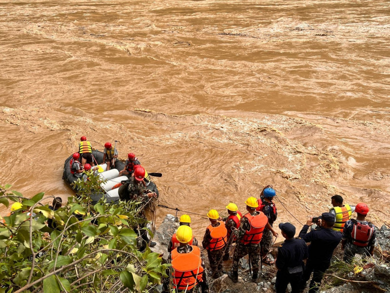 65 missing in Nepal after landslide sweeps buses into river