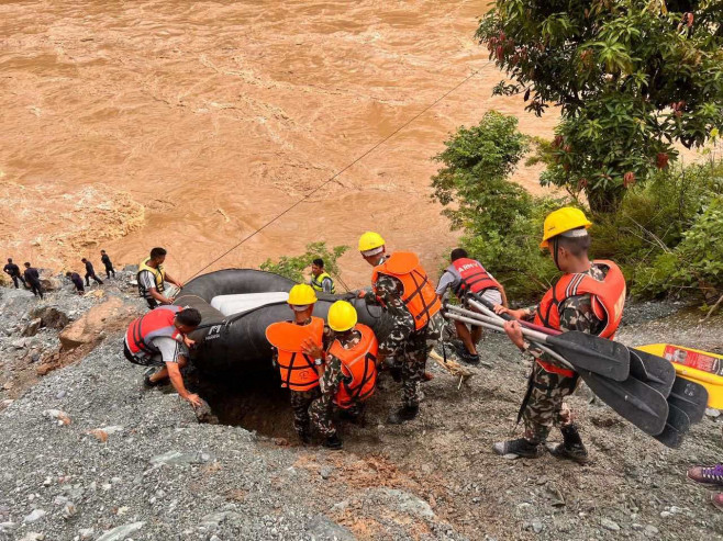 65 missing in Nepal after landslide sweeps buses into river