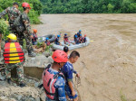 Rescue efforts ongoing for 65 missing in Nepal after landslide sweeps buses into river