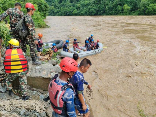 Rescue efforts ongoing for 65 missing in Nepal after landslide sweeps buses into river