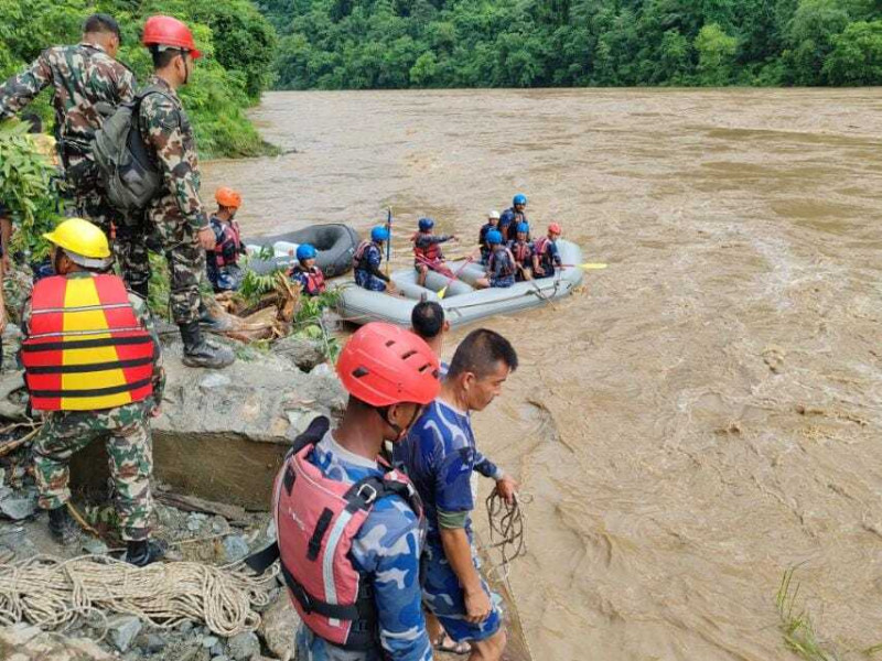 Rescue efforts ongoing for 65 missing in Nepal after landslide sweeps buses into river