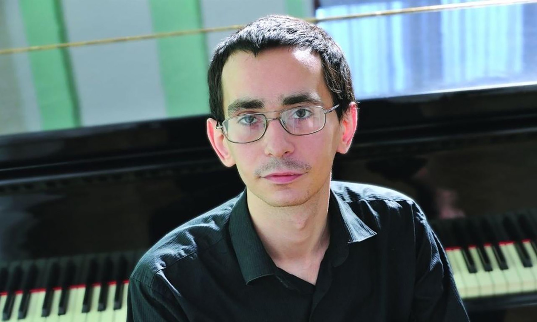 Un pianist rus de doar 39 de ani, care l-a criticat pe Putin și războiul din Ucraina, a murit într-o închisoare din Extremul Orient rus