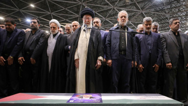 Iranian Supreme Leader Ayatollah Ali Khamenei (C) leads a prayer over the coffins of Hamas leader Ismail Haniyeh