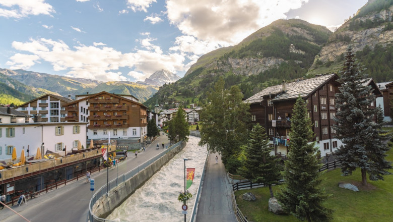 Switzerland, Valais, Town in mountain landscape