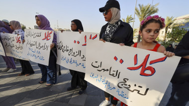 Activists demonstrate against female child marriages in Tahrir Square in central Baghdad on July 28, 2024