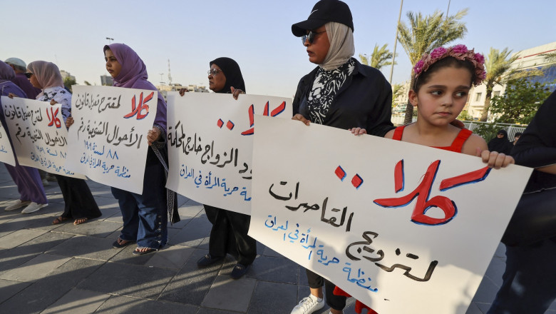 Activists demonstrate against female child marriages in Tahrir Square in central Baghdad on July 28, 2024