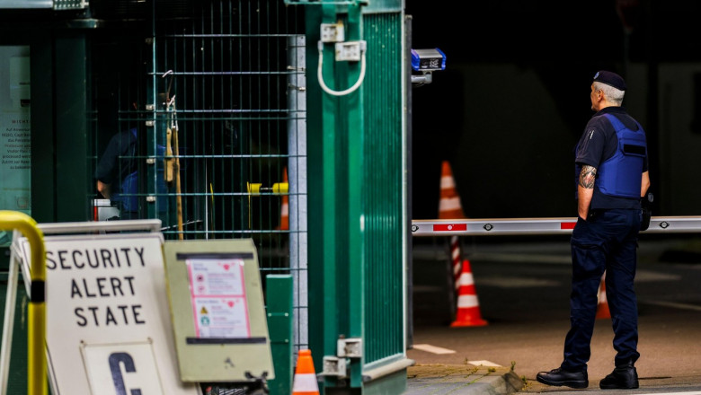 Geilenkirchen Germania 22nd Aug, 2024. Soldiers guard the entrance area, on the left is a sign indicating the current status C of the security situation. After security incidents at military sites, NATO sends employees at Geilenkirchen airfield home. The