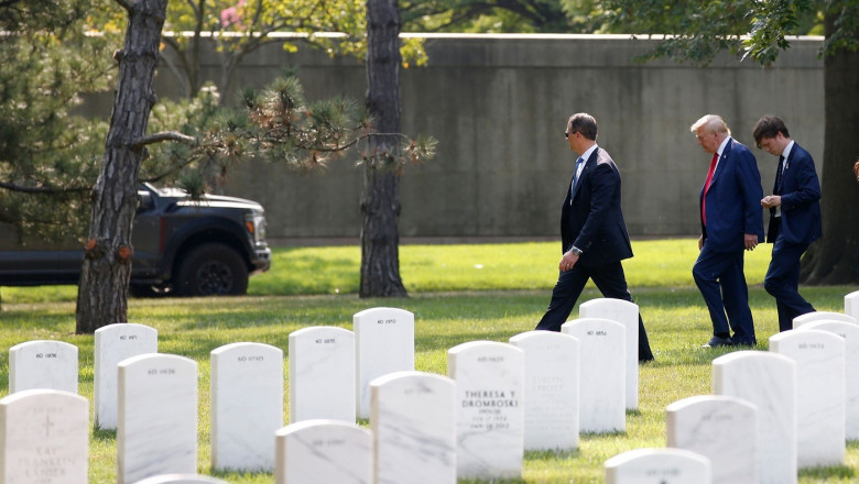 Republican presidential candidate, former President Donald Trump departs an event at Arlington National Cemetery