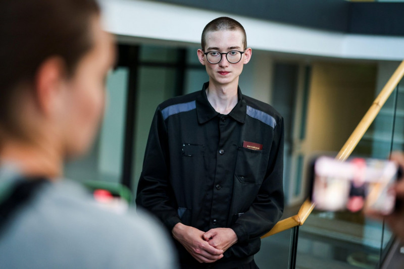 Bonn, Germany. 02nd Aug, 2024. The German-Russian Kevin Lick, released in a prisoner exchange, stands on the sidelines of a press conference organized by the Foundation Against Corruption. The event is moderated by Volkov from the Foundation Against Corru