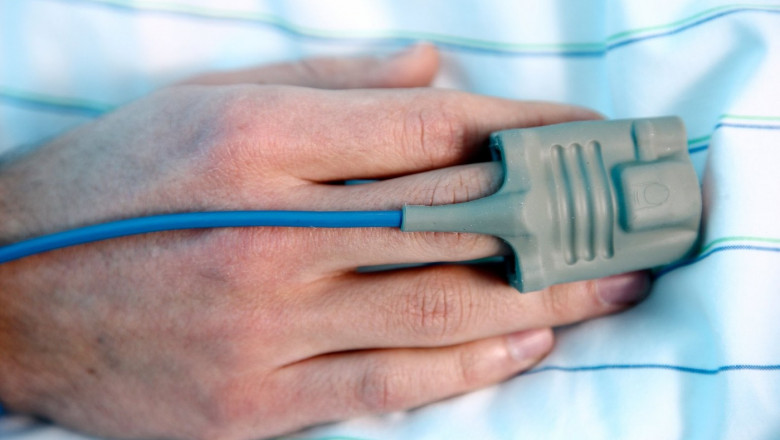 Intensive care unit in a hospital. A patient is connected to different life support systems.