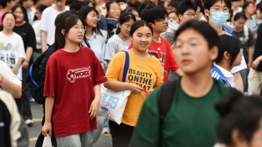 Fuyang, China. 08th June, 2024. On the second day of China's 2024 national college entrance examination, students walk out of the exam hall after taking a foreign language test at Hongqi Middle School in Fuyang city, Anhui province. The number of applican