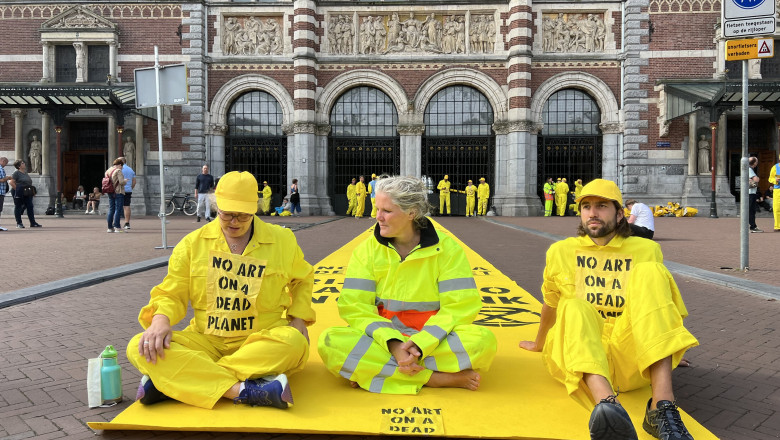 Climate activists block the entrance to the Rijksmuseum, the largest museum in the Netherlands