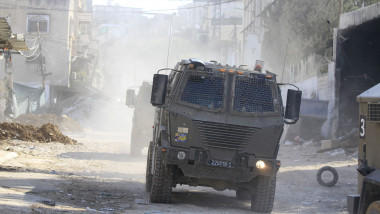 Israeli armoured vehicles drive on a destroyed street during a raid in Tulkarem, Tulkarem, West Bank, Palestinian Territory - 10 Sep 2024