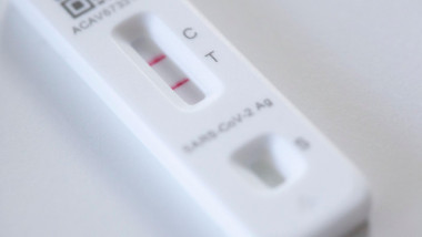 London, UK, 15 January 2024: a lateral flow test with two red lines shows a positive result for Covid. Cases surged in the UK over Christmas and New Year. Around 70% of new cases are of the highly transmissible Juno variant. Anna Watson/Alamy Live News