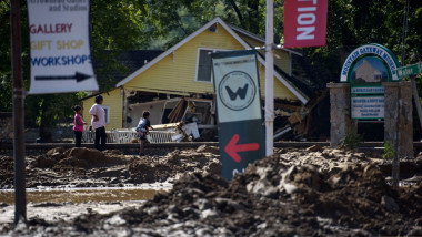 People view damage in the aftermath of Hurricane Helene on September 29, 2024 in Old Fort, North Carolina