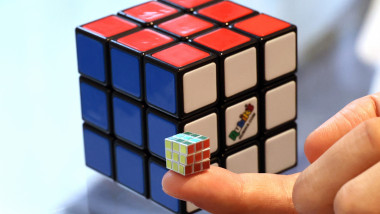 Japanese toymaker MegaHouse displays the world's smallest Rubik's Cube to celebrate the 40th anniversary