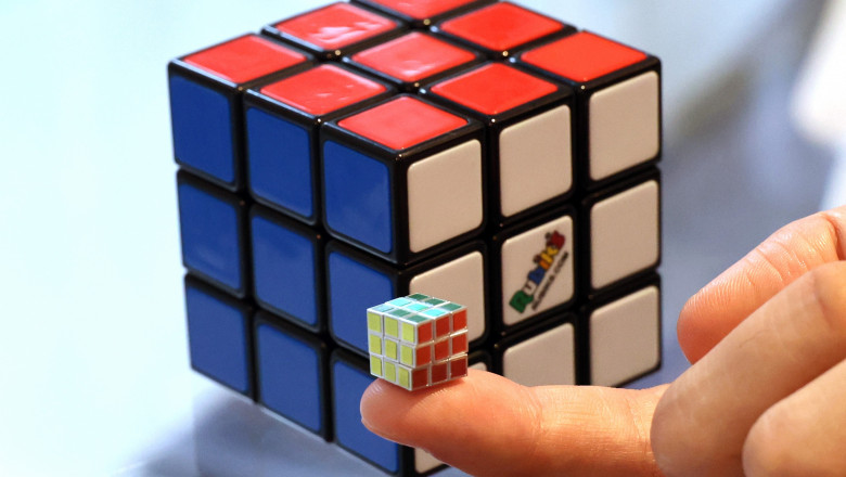 Japanese toymaker MegaHouse displays the world's smallest Rubik's Cube to celebrate the 40th anniversary