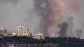 Kyiv, Ukraine - July 08 2024: Smoke rises over the city skyline after Russian combined missile strike to the civilian infrastructure of the capital ci