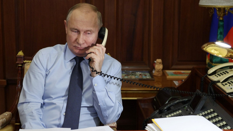 vladimir putin vorbește la telefon