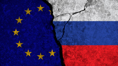 Political relationship between European Union and russia. National flags on cracked concrete background