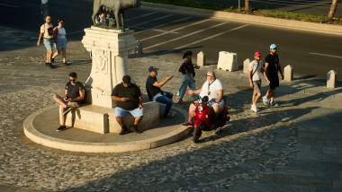 Bucharest, Romania. 22nd July, 2024: The Capitoline Wolf Statue located in front of the Bucharest Store where people wait to sign "The enrolment contract in the Simion plan", during a presidential campaign action of George Simion, the candidate from the r