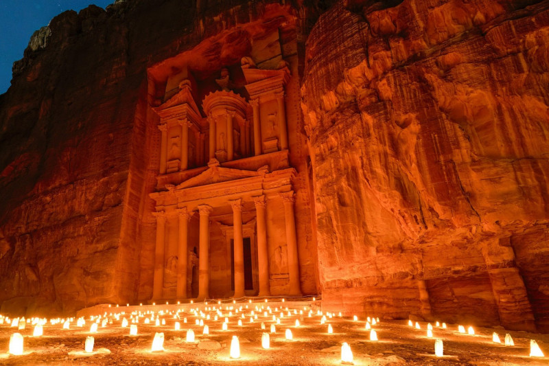 The Treasury in Petra, Jordan lit up with candles