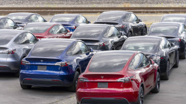 New Tesla cars and Cybertrucks in storage lot