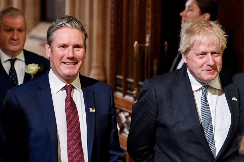 File photo dated 10/05/22 of Prime Minister Boris Johnson (right) with the leader of the Labour Party Keir Starmer, walking through the Members' Lobby at the Palace of Westminster ahead of the State Opening of Parliament in the House of Lords, London. Iss