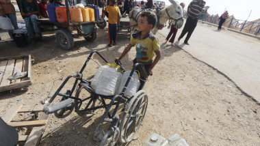 Palestinians, including children, who migrated from Rafah to Deir al-Balah due to Israeli attacks