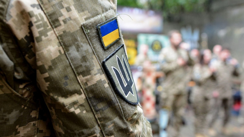 Armband chevron of the Armed Forces and the flag of Ukraine during the military volunteer auction in aid of the Armed Forces of Ukraine, October 5, 2024, Kyiv, Ukraine