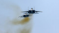 2 F-15 Eagle fighter aircraft of the Israeli Air Force Aerobatic Team fly