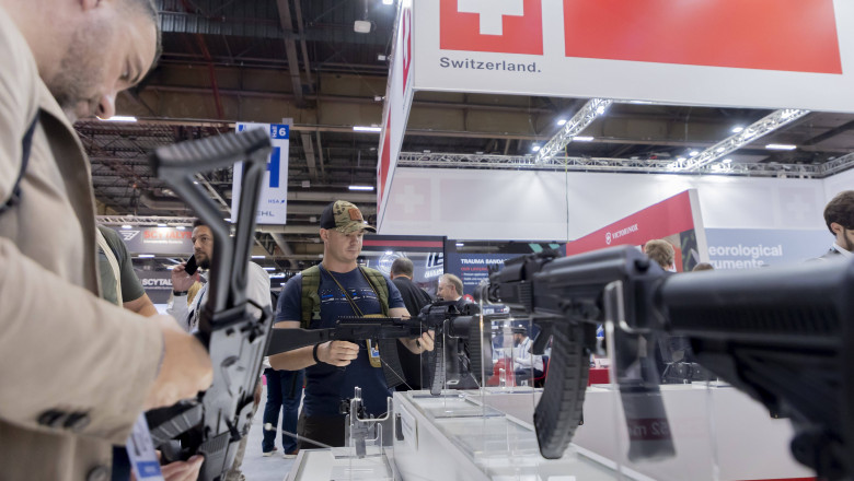 Villepinte, France June 19, 2024 - Weapons are displayed next to the Swiss stand during the Eurosatory exhibition - The